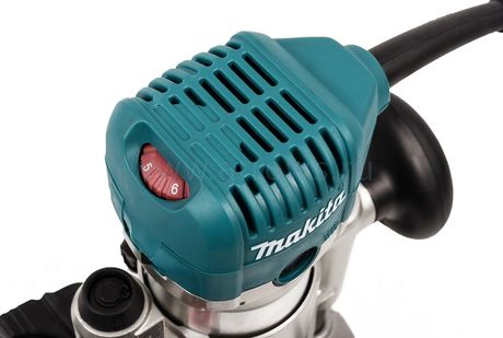 Фрезерная машина MAKITA кромочная RT0700CX2 (710 Вт, цанги 6-8мм,10000-30000об, набор по (RT0700CX2)